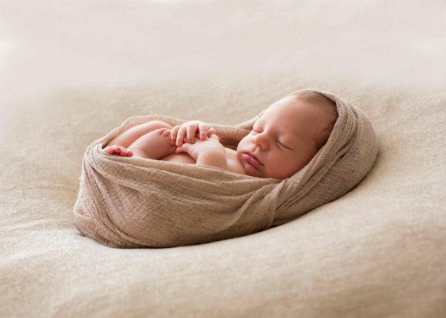 sleepy cocoon newborn portrait